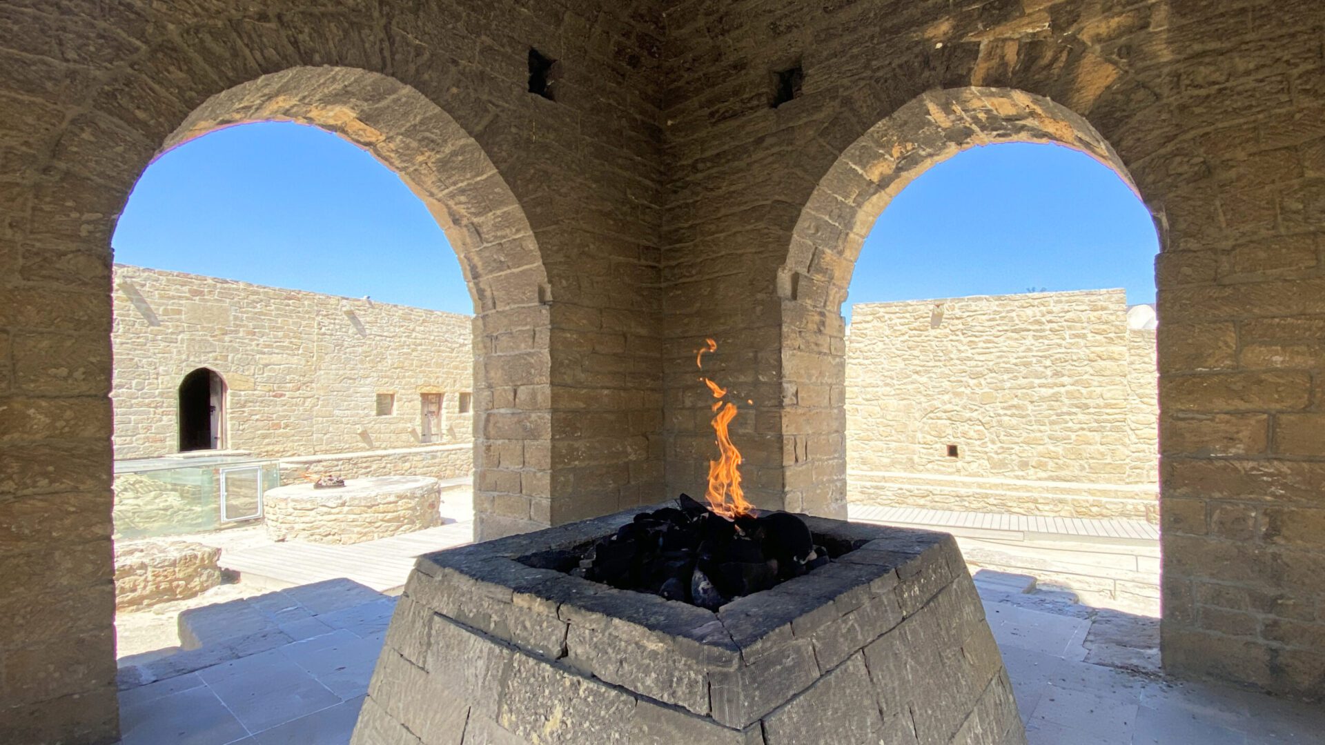 Ateshgah is a temple of fire in Azerbaijan. An eternal flame is burning in a stone structure with arched openings. The temple of fire worshippers Atashgan